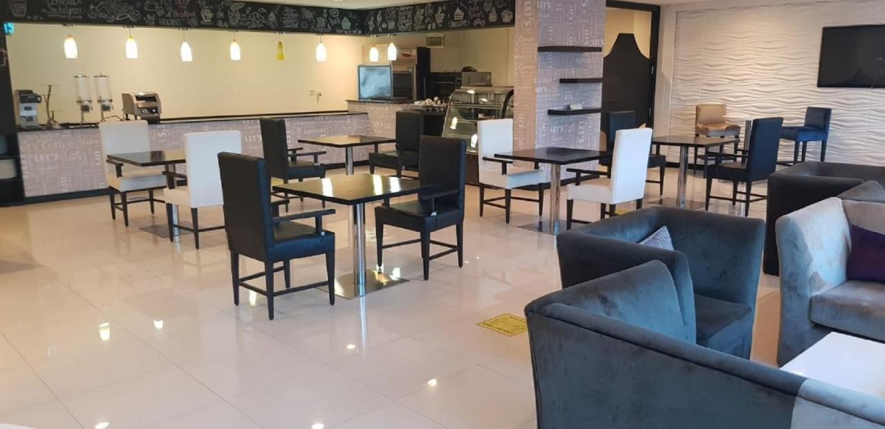 Tulip Hotel & Suites Manama Exterior photo